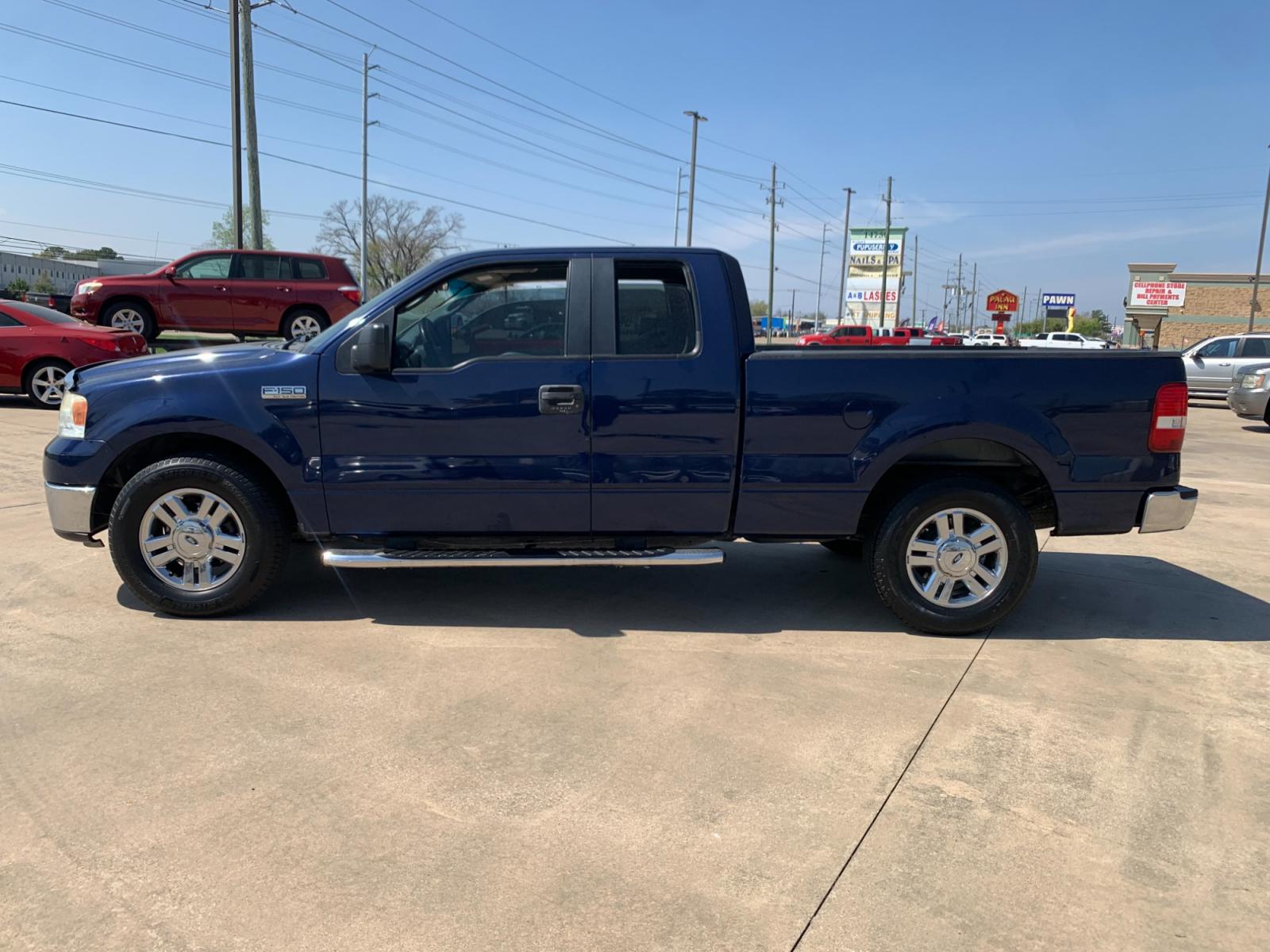 2008 BLUE /black Ford F-150 Lariat SuperCab 2WD (1FTPX12V48K) with an 5.4L V8 SOHC 24V FFV engine, 4-Speed Automatic Overdrive transmission, located at 14700 Tomball Parkway 249, Houston, TX, 77086, (281) 444-2200, 29.928619, -95.504074 - Photo #3
